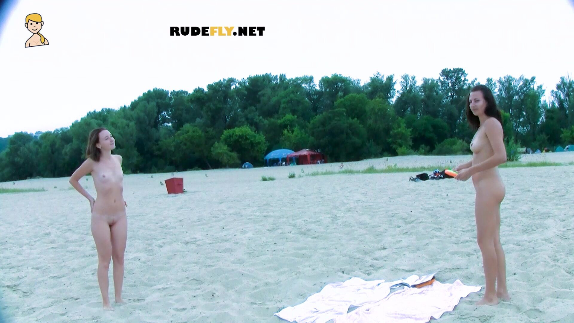 Nudist teen enjoys a beautiful day at the beach - nudist - teen - amateur - voyeur - beach - tanning - public - rudefly