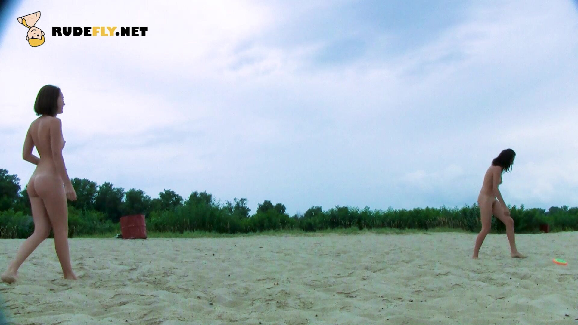 Nudist teen enjoys a beautiful day at the beach - nudist - teen - amateur - voyeur - beach - tanning - public - rudefly