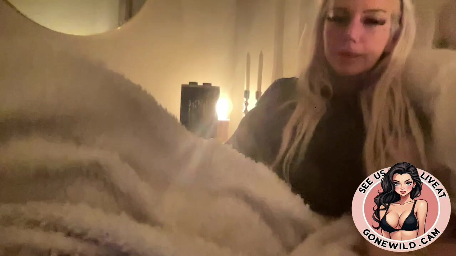 Inked Blonde Bombshell Holding Toys in Bed - tattoo - blonde - solo - tease - bedroom - toys - long nails - inked - masturbation - softcore
