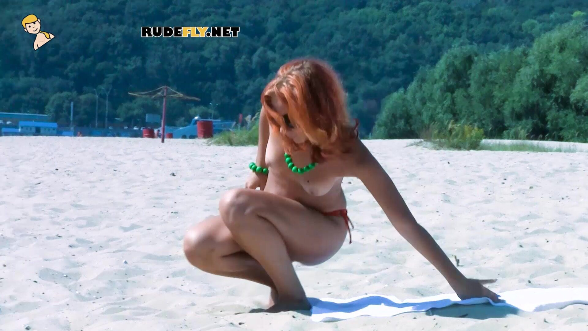 Hot nudist teen jumps in the water - nudist - teen - amateur - voyeur - beach - tanning - public - rudefly