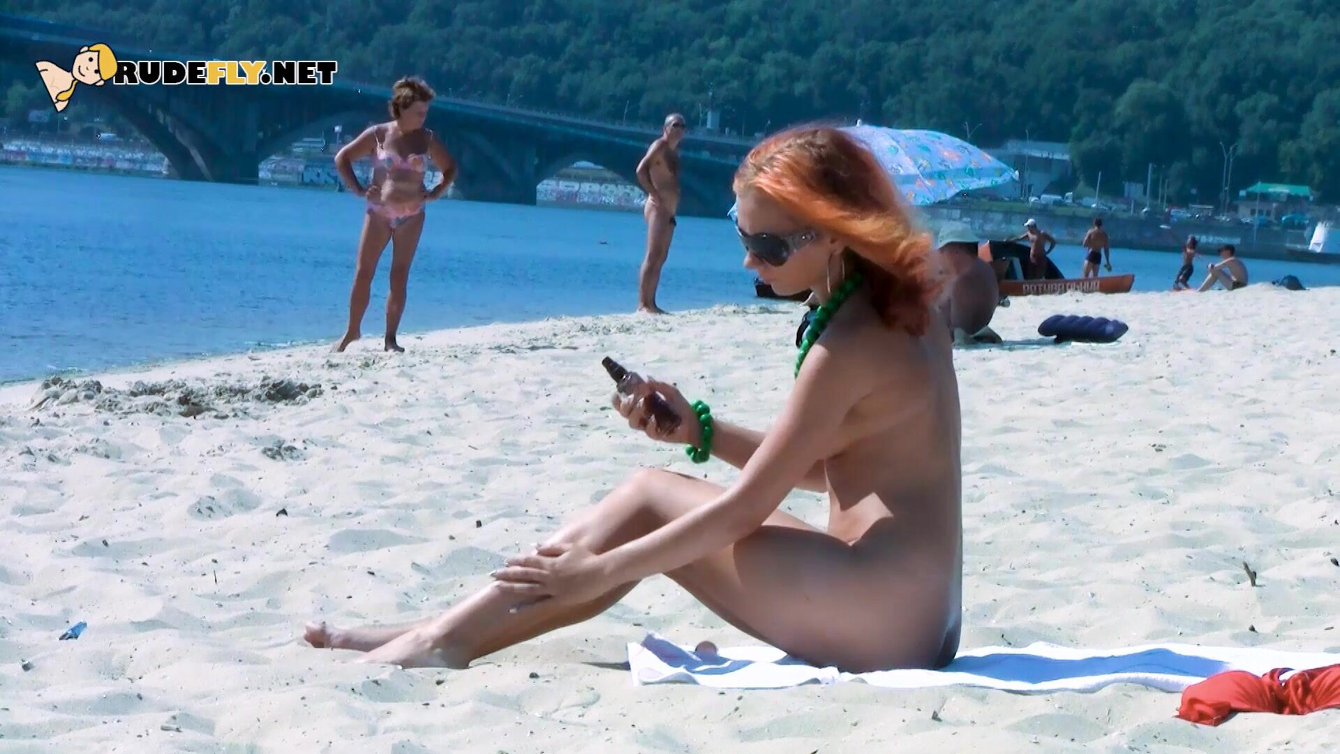 Hot nudist teen jumps in the water - nudist - teen - amateur - voyeur - beach - tanning - public - rudefly