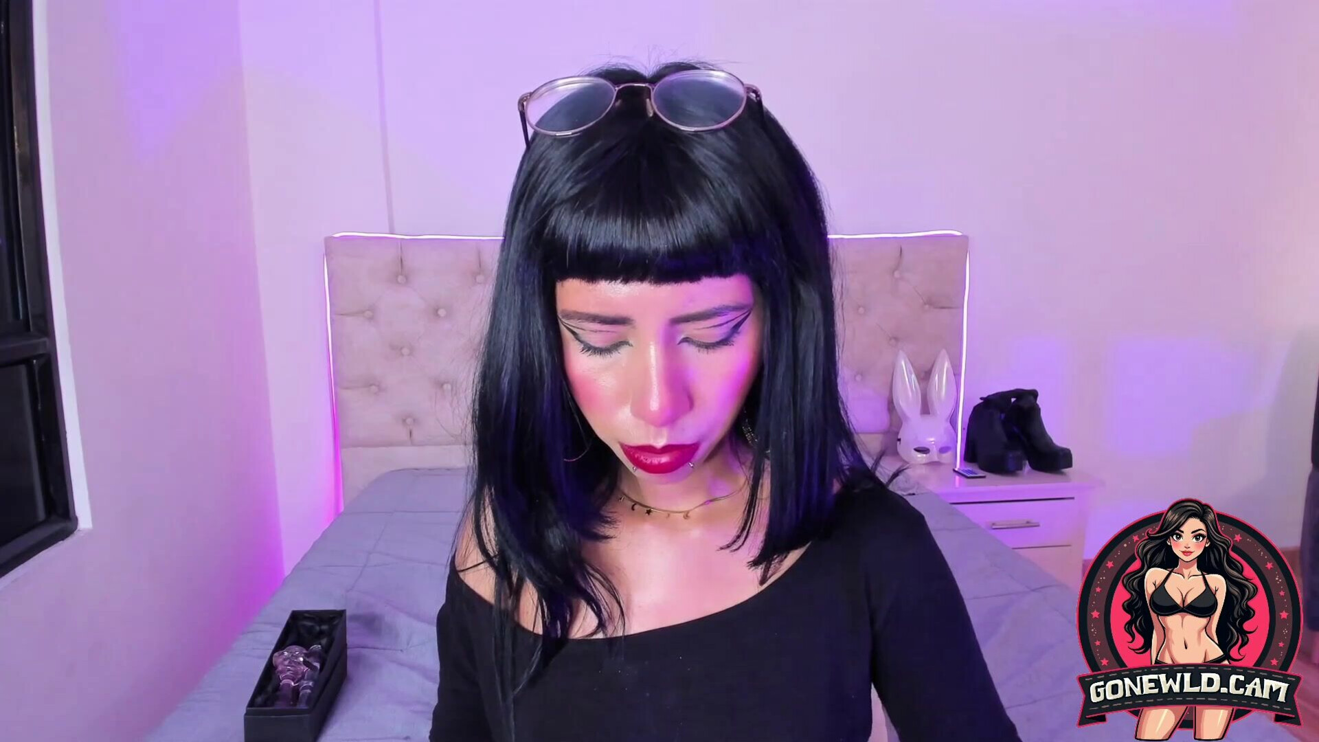 Sultry Goth Babe with Bangs Teases in Cut Out Lingerie - goth - tease - lingerie - solo - brunette - piercing - tattoo - makeup - webcam - bedroom