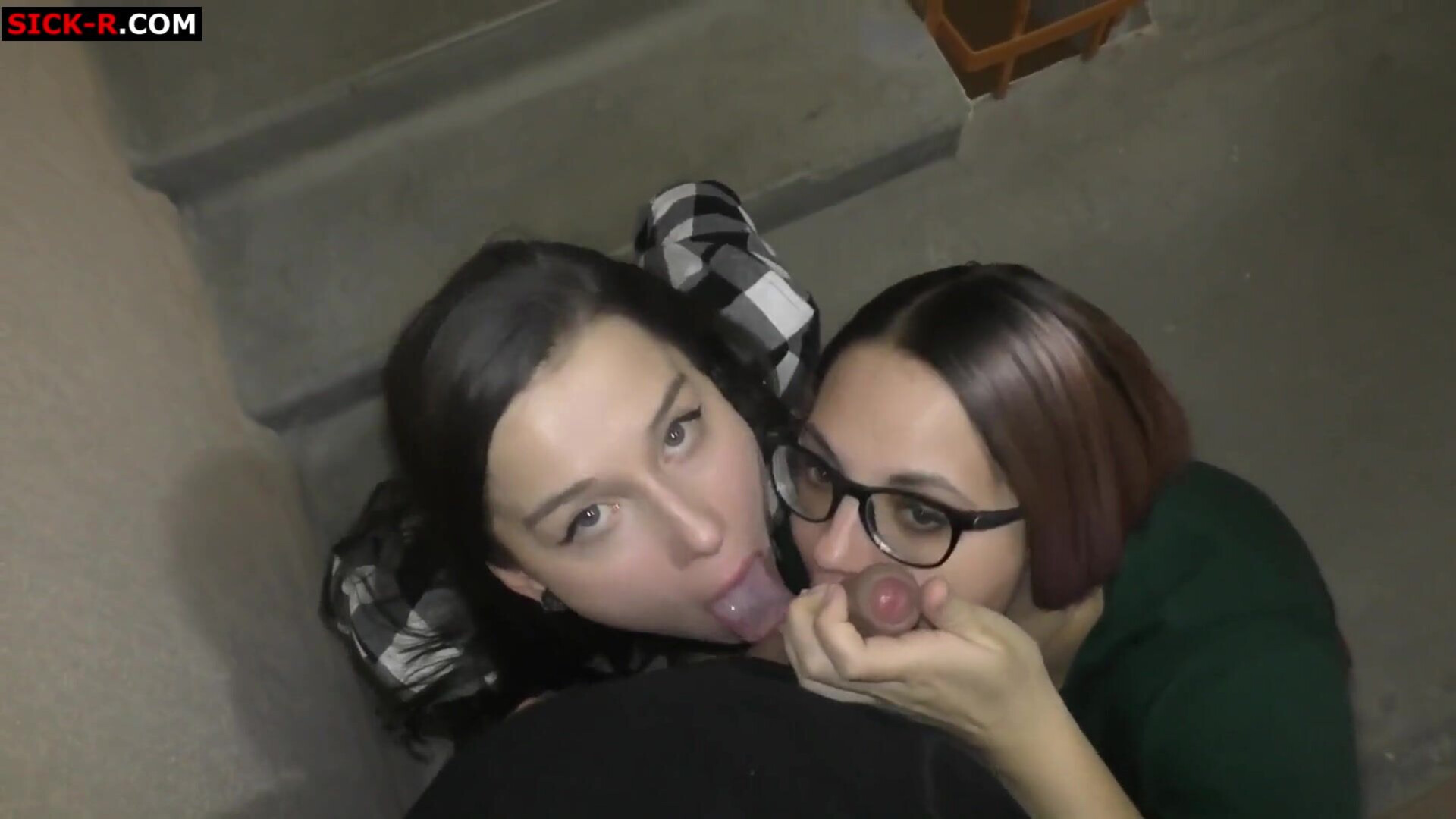 Two sisters suck a big coock stairwell of the apartment building - enjoying - herself - wearing - glasses - risky - hot