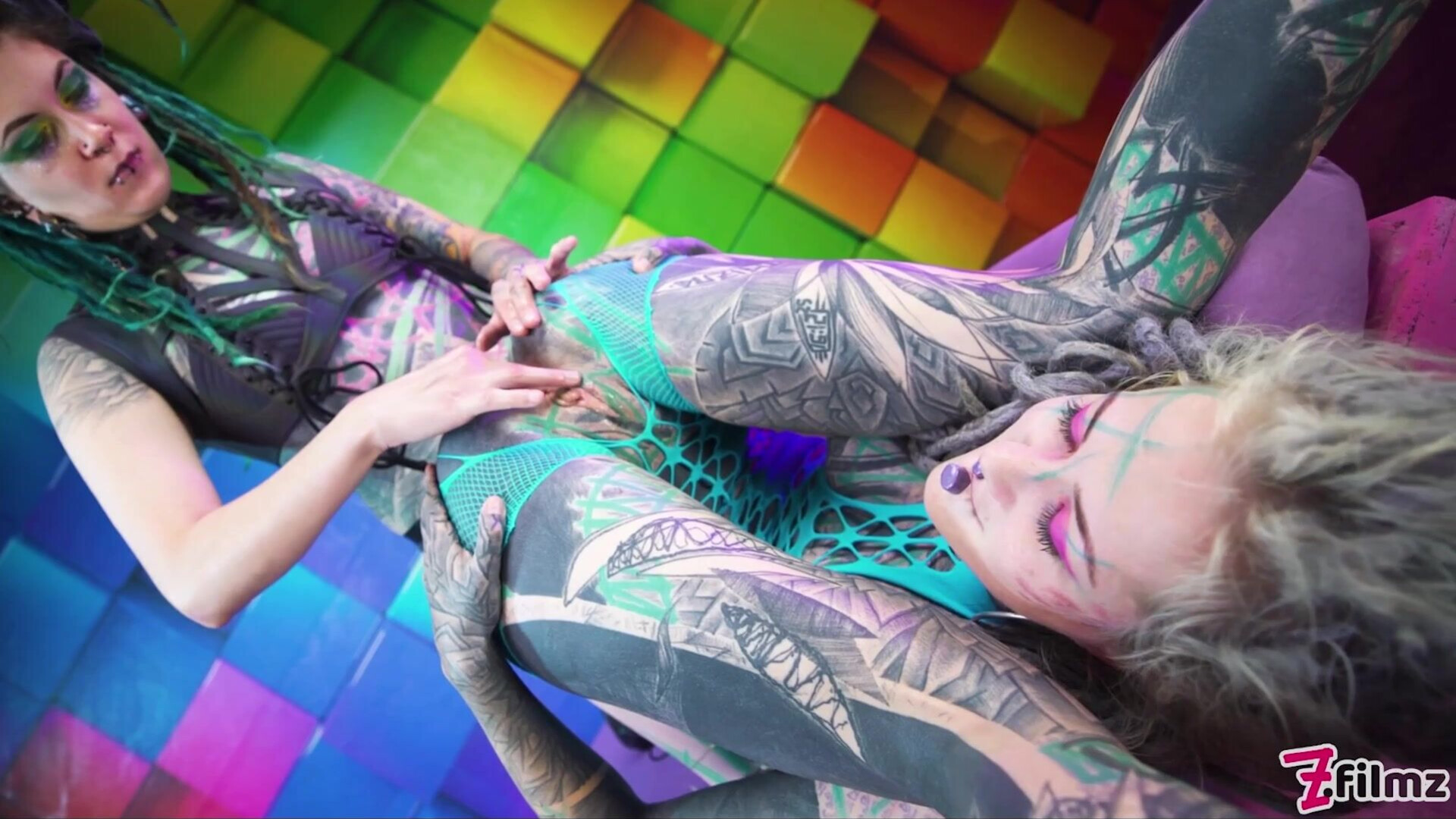 Illuz has a strapon to use on Anuskatzz - zfilmz - tattoos - tattooed - lesbian - femdom - strapon - strap on - anal - gaping - fingering
