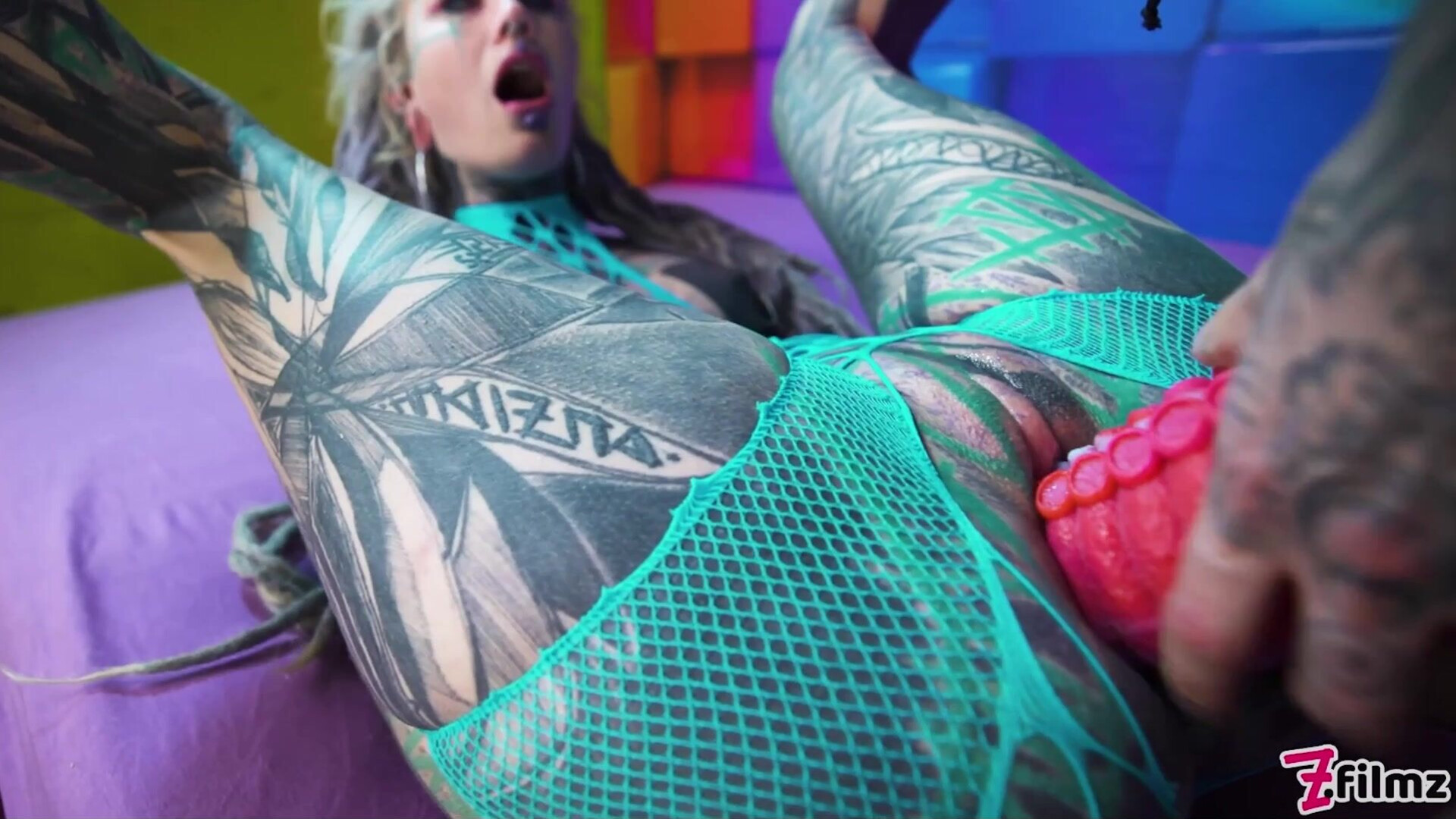 Illuz has a strapon to use on Anuskatzz - zfilmz - tattoos - tattooed - lesbian - femdom - strapon - strap on - anal - gaping - fingering