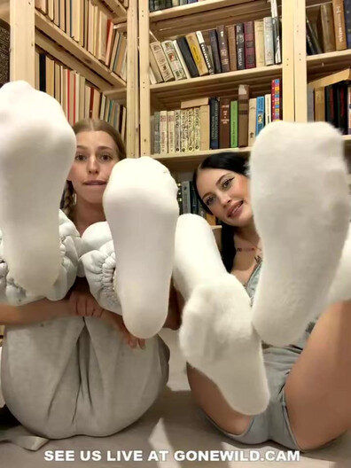 Tattooed Babes with Pigtails Tease in Library - library - pigtails - tattoo - topless - tease - feet - socks - sweats - camgirl - playful