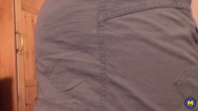 The petite woman with closely cropped hair is receiving vigorous anal penetration fro - mature - doggy style - high heels - big ass - big cock - couple - riding - short hair - kitchen - shorts