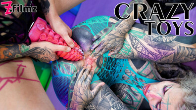 Illuz has a strapon to use on Anuskatzz - zfilmz - tattoos - tattooed - lesbian - femdom - strapon - strap on - anal - gaping - fingering