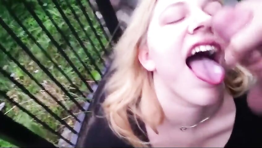 Blonde Takes Cumshot Outside